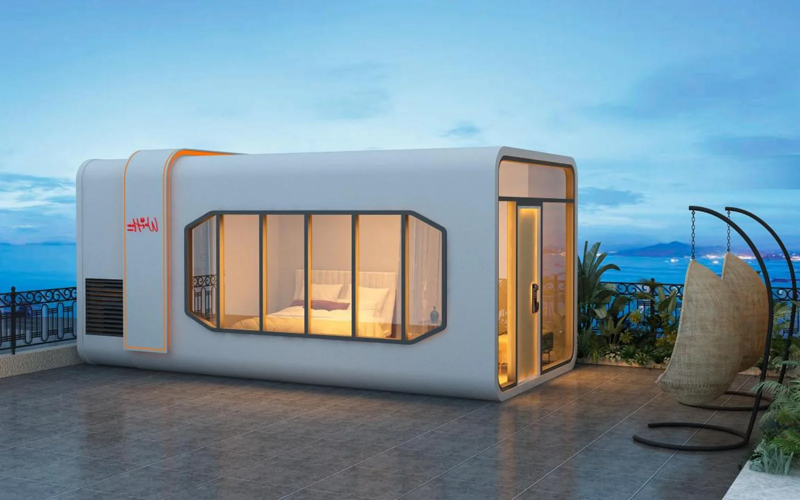 Compact Podcabin beside the coast with warm interior lighting